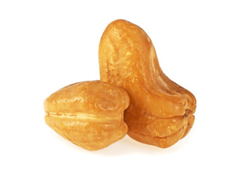 Roasted cashew nuts isolated on a white background