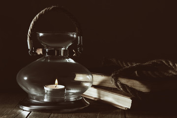 Candlestick  and books