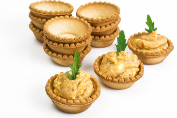 Portion appetizer of tartlets with fish paste