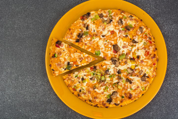 Pizza with mushrooms, cheese and paprika