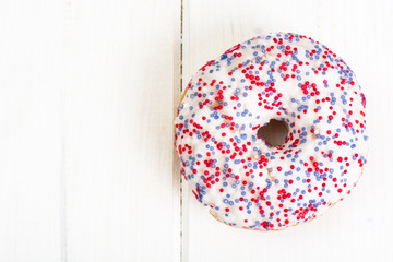 Fresh sweet donut with white icing