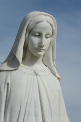 Close up of gravestone memorial of blessed Virgin Mary