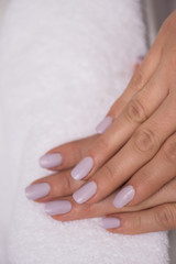 Fototapeta premium woman fingers with french manicure