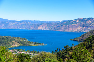 Fototapeta na wymiar Panorama view of the lake Atitlan and volcanos in the highlands of Guatemala