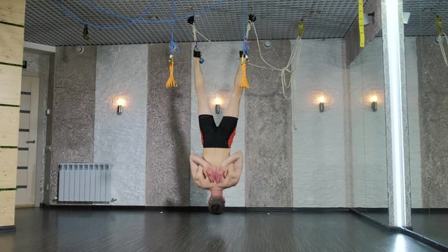 A man performs exercises alfagraviti in the studio 4k
