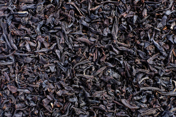 Heap of dry black tea texture macro