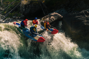Rafting on dangerous mountain river - 145646382