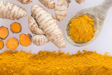 Roots and turmeric powder (Curcuma longa)