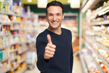 Thumbs up in supermarket