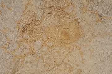 yellow wall with cracks