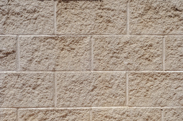 wall of brick with white seams