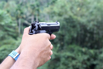 gun in man hand
