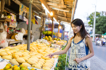 Woman shopping on the street market