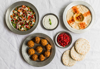 Selection of traditional Arab and Jewish food, selective focus. Healthy food, fitness, and sport diet concept.