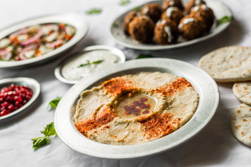 Selection of traditional Arab and Jewish food, selective focus. Healthy food, fitness, and sport diet concept.
