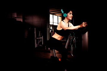 Fototapeta na wymiar Woman exercise in gym.