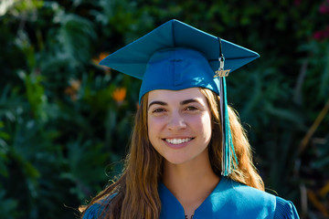 Graduation celebration portrait of young female