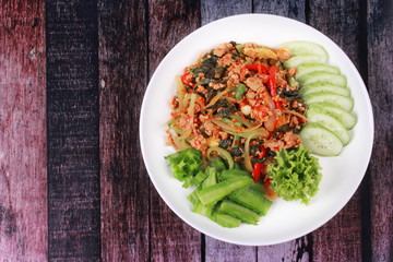 Fried spicy basil with minced pork .