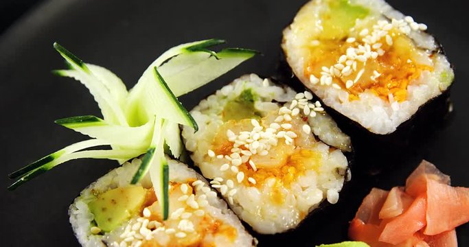 Maki sushi roll served on tray