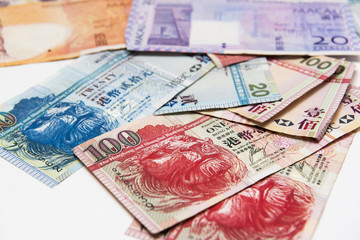 Stacked of Hong Kong and Macau Dollar bills,close up
