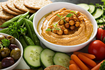 Hummus and vegetables platter with grain salad - obrazy, fototapety, plakaty