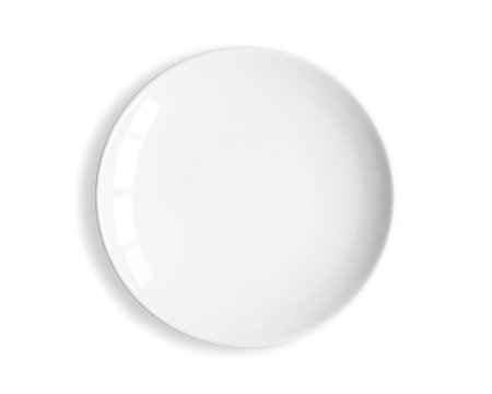Top view of blank white dish on a white background.