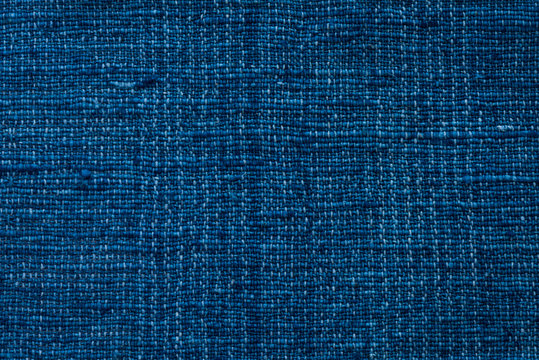 Closeup dark blue yarn textile background and textured