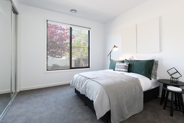 Designer styled bedroom with garden outlook