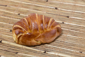 Croissant Brioche on a bamboo rustic placemat