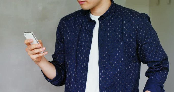 Business executive using mobile phone