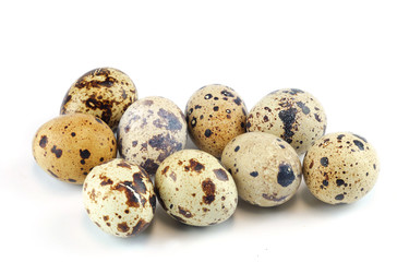 fresh quail eggs isolated on white background