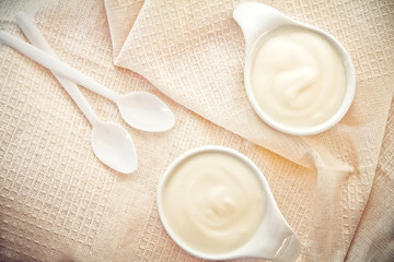 Fototapeta na wymiar Close up natural creamy white yogurt in cup