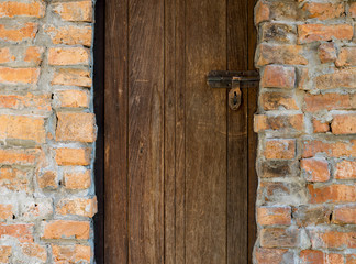 wood door and brick wall