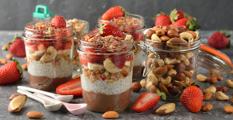 Dietary dessert with chia seeds, muesli and strawberries