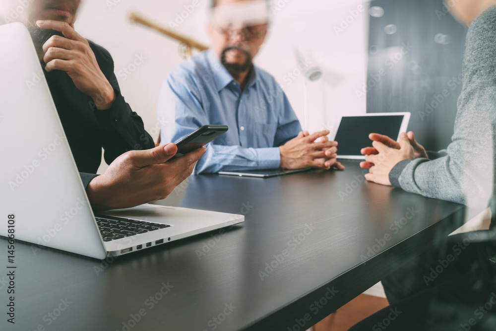 Poster co working team meeting concept,businessman using smart phone and digital tablet and laptop computer