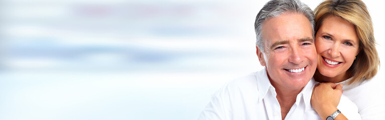 Senior couple smiling.