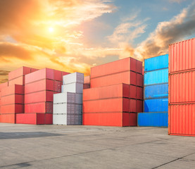 Industrial port container terminal at sunset