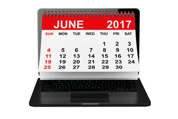 June 2017 calendar over laptop screen. 3d rendering