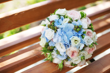delicate bouquet of roses and hydrangeas