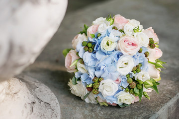 delicate bouquet of roses and hydrangeas