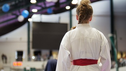 Sport teenagers - female sportsmen on karate - ready for fight