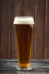 beer glass on a wooden background