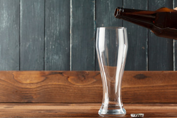Glass of beer and beer bottle