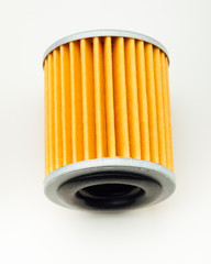 oil filter part for car, white background