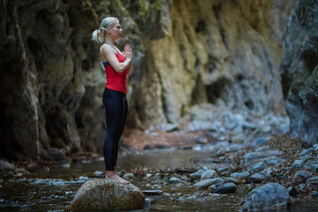 Young woman doing yoga outdoor