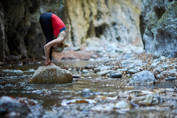 Young woman doing yoga outdoor