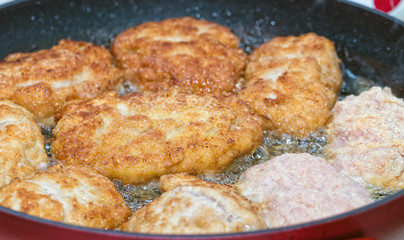 Cutlets from minced meat fried in a pan
