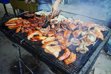 crispy grilled pork with skin. grilled pork thai style.