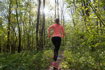 Runner girl green spring forest