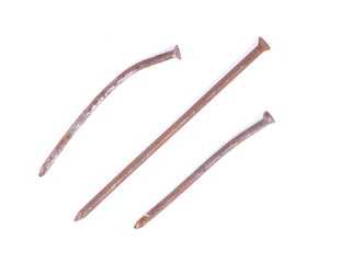Old rusty nails on a white background